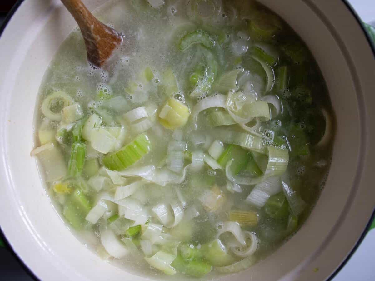 Chopped leeks, celery, in saucepan with water added.