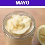 Text overlay, Homemade FRENCH MAYO, above image of mayonnaise in glass jar, next to squeezed lemon half.